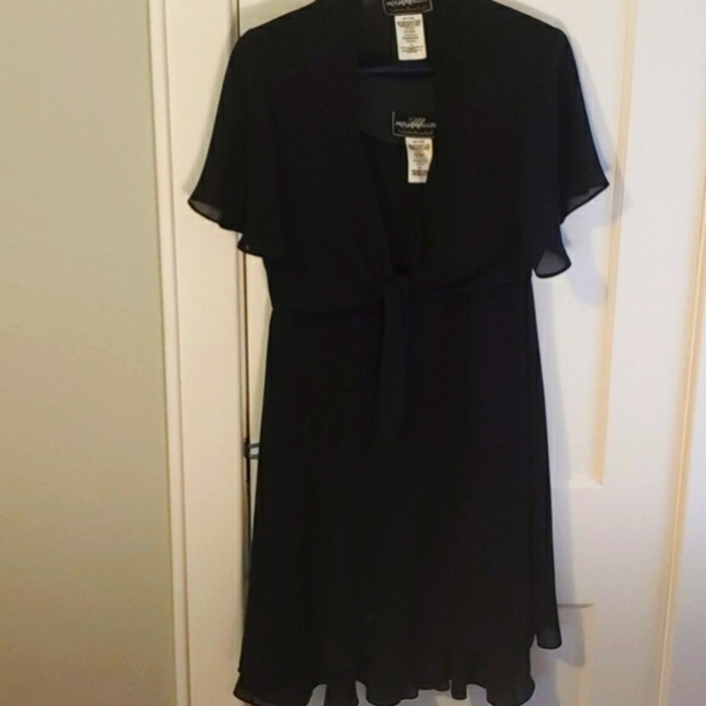 Sleeveless black dress with shear top